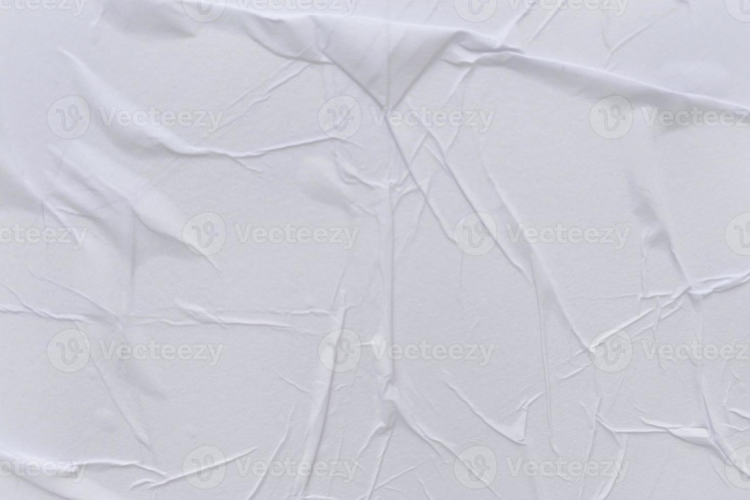 Blank white paper is crumpled texture background. Crumpled paper texture backgrounds for various purposes photo