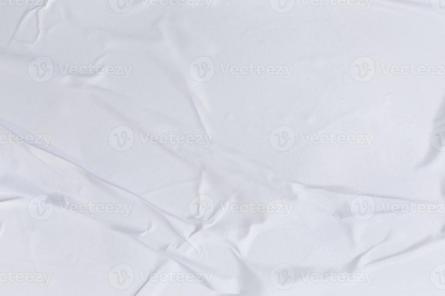 Blank white paper is crumpled texture background. Crumpled paper texture backgrounds for various purposes photo