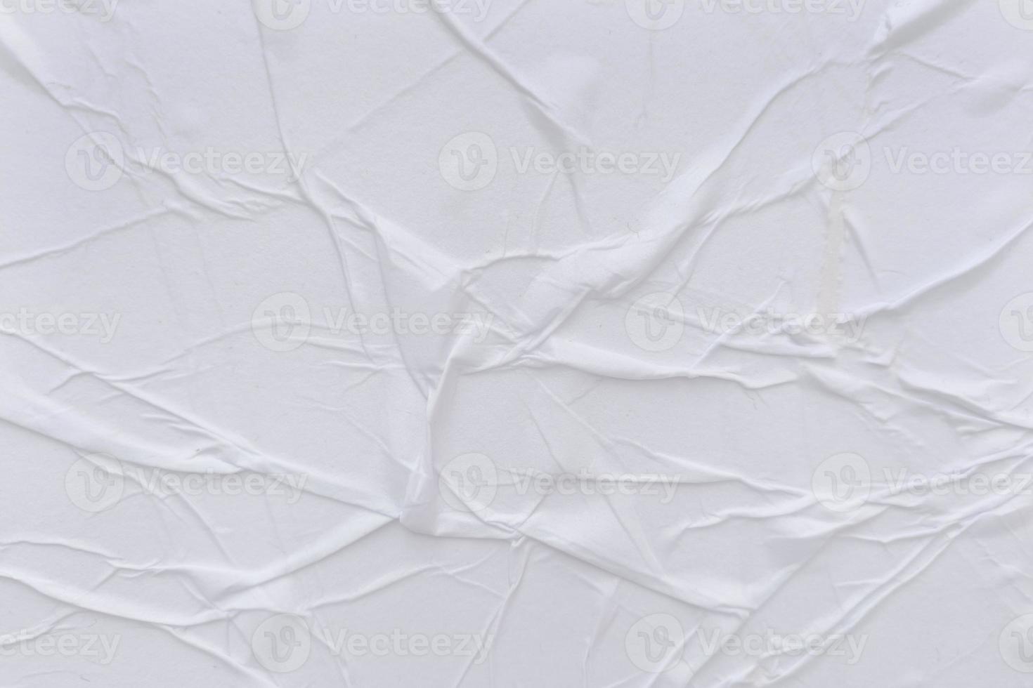 Blank white paper is crumpled texture background. Crumpled paper texture backgrounds for various purposes photo