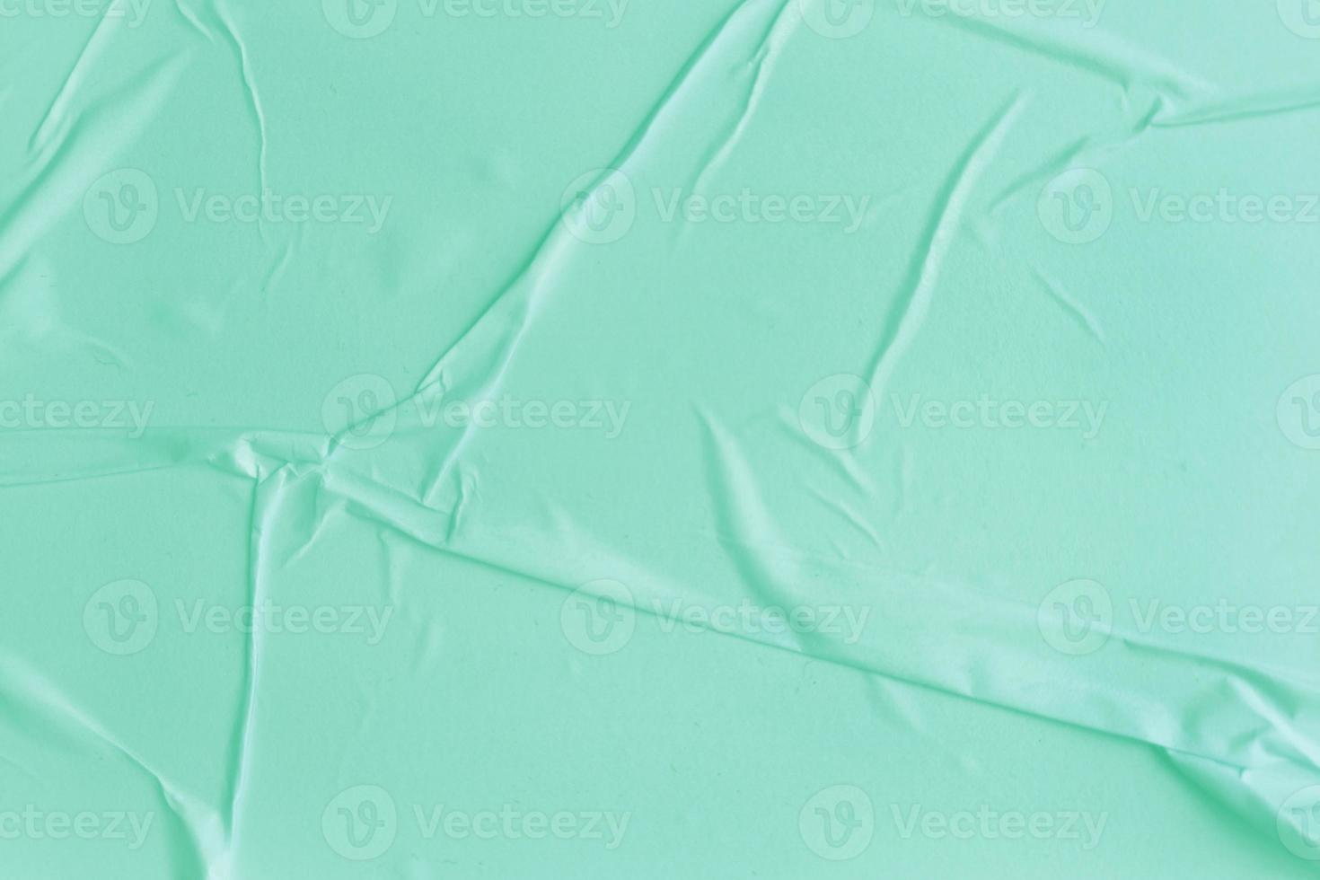 Blank blue paper is crumpled texture background. Crumpled paper texture backgrounds for various purposes photo