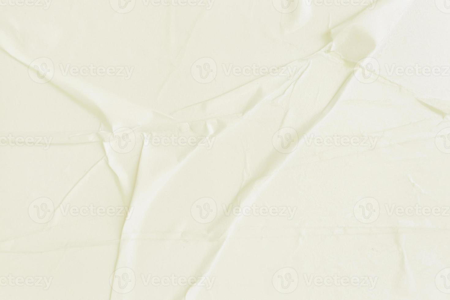 Blank cream paper is crumpled texture background. Crumpled paper texture backgrounds for various purposes photo