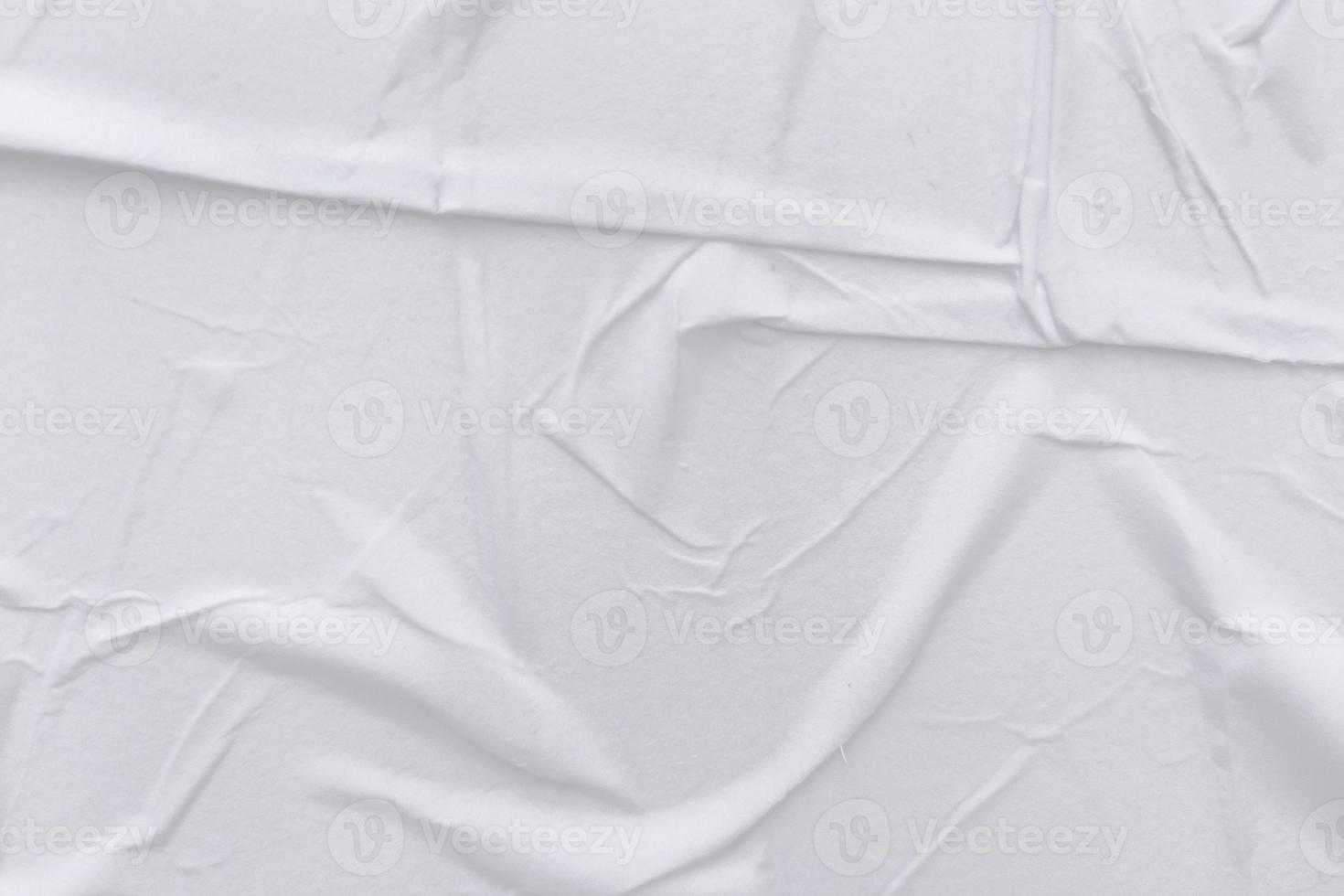Blank white paper is crumpled texture background. Crumpled paper texture backgrounds for various purposes photo