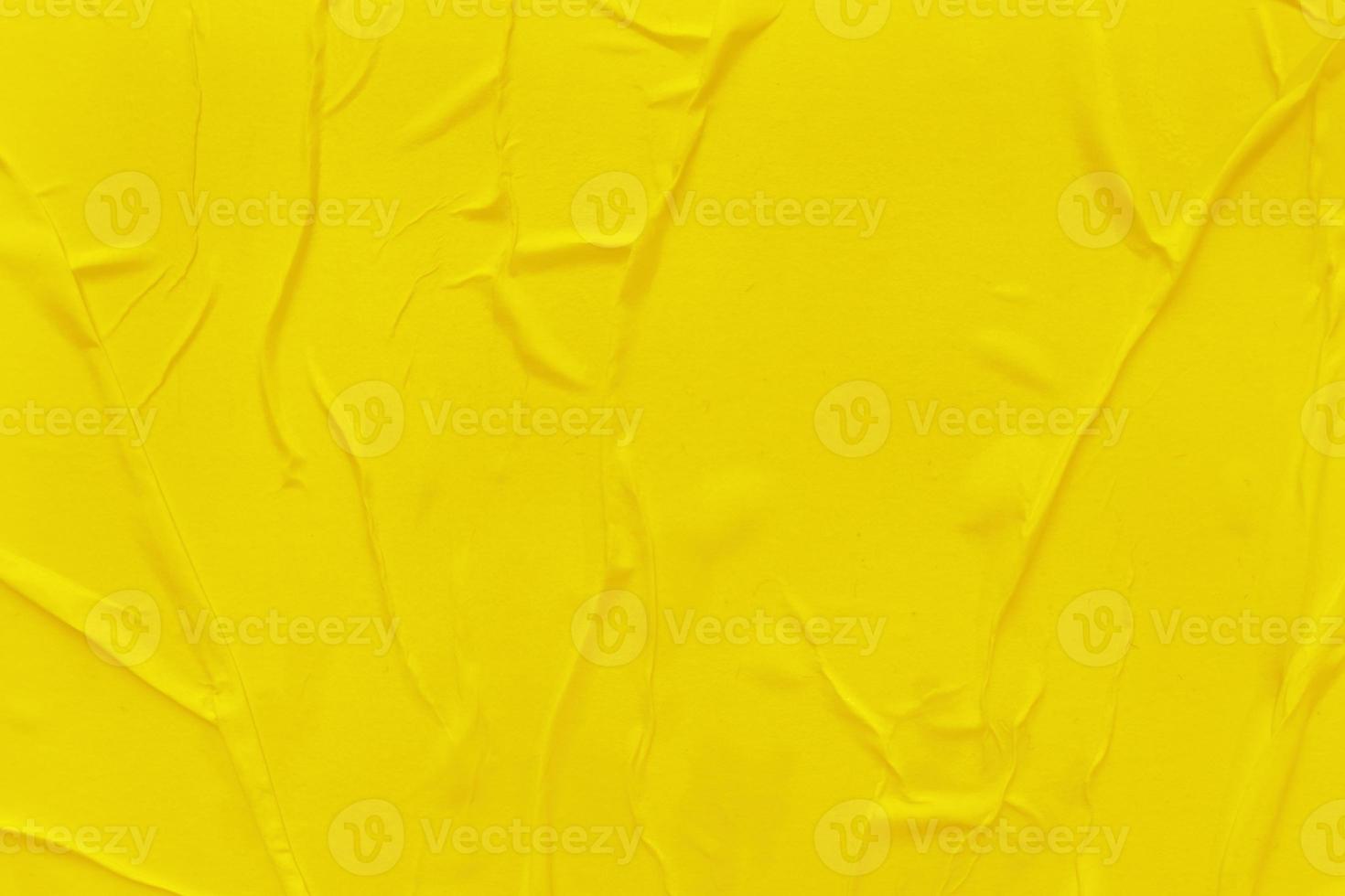 Blank yellow paper is crumpled texture background. Crumpled paper texture backgrounds for various purposes photo
