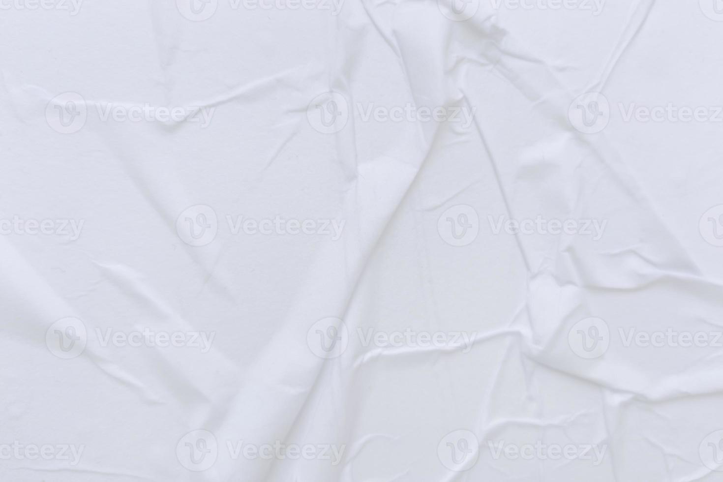 Blank white paper is crumpled texture background. Crumpled paper texture backgrounds for various purposes photo