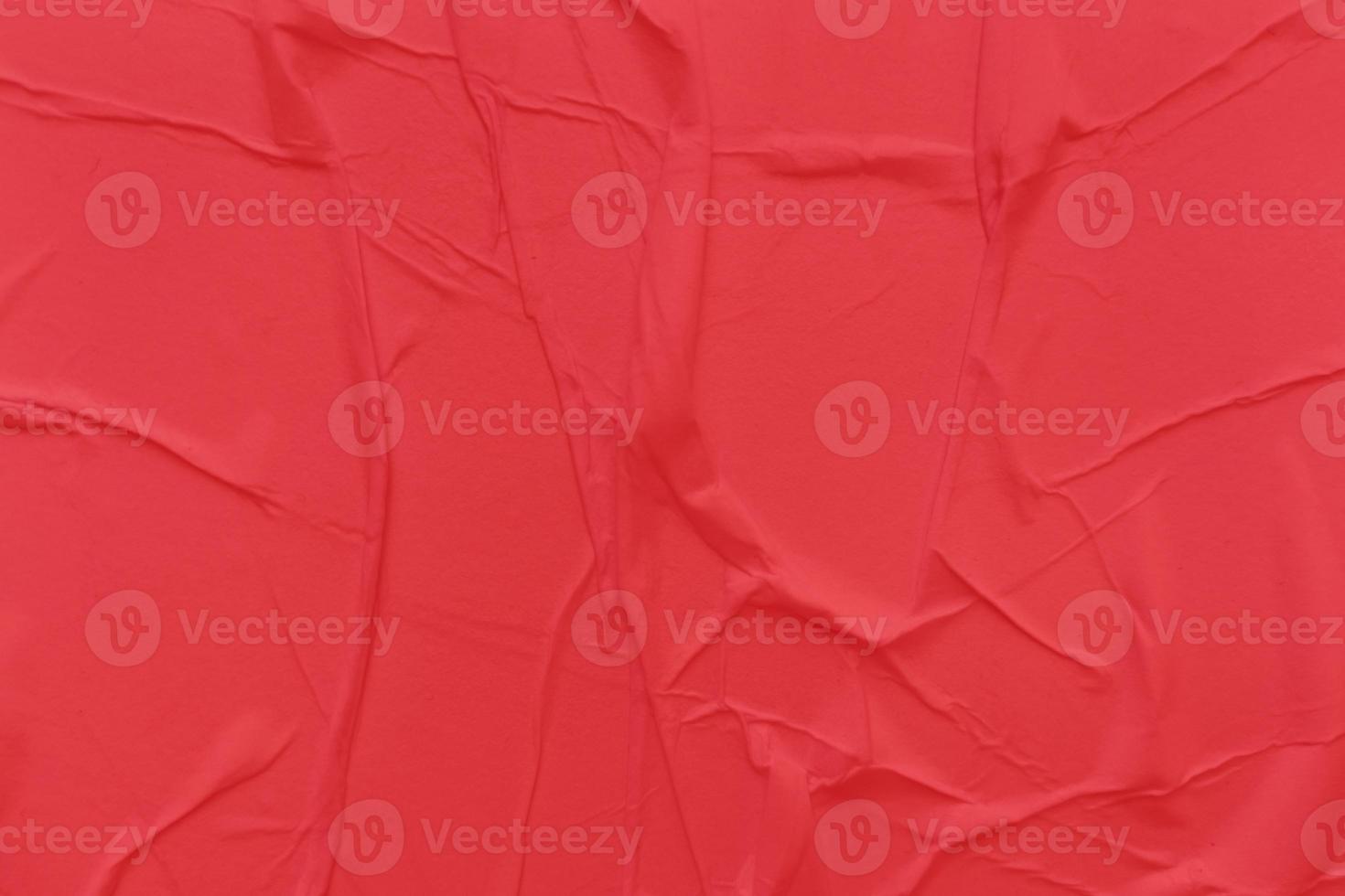 Blank red paper is crumpled texture background. Crumpled paper texture backgrounds for various purposes photo