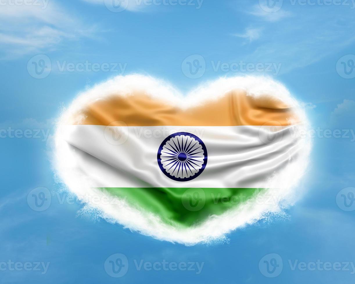 Indian flag in heart shape on blue sky photo