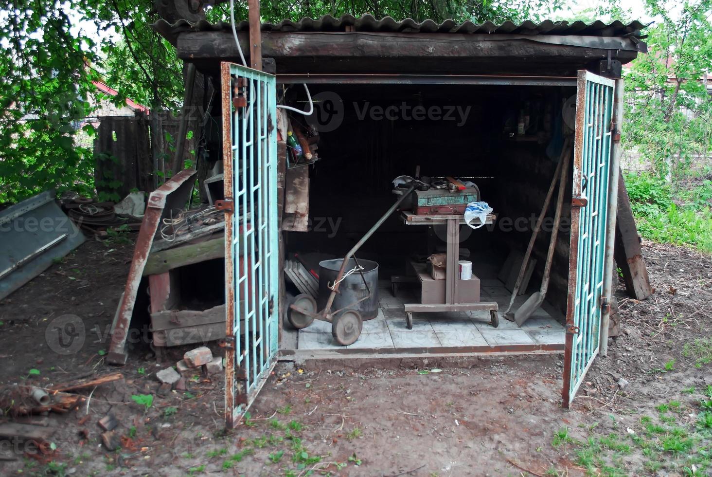 old barn and iron gate photo