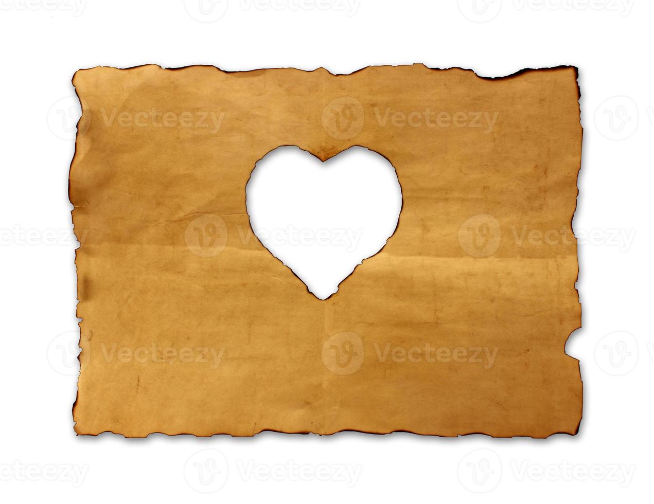 hoja de papel vieja con el símbolo del corazón para el fondo foto