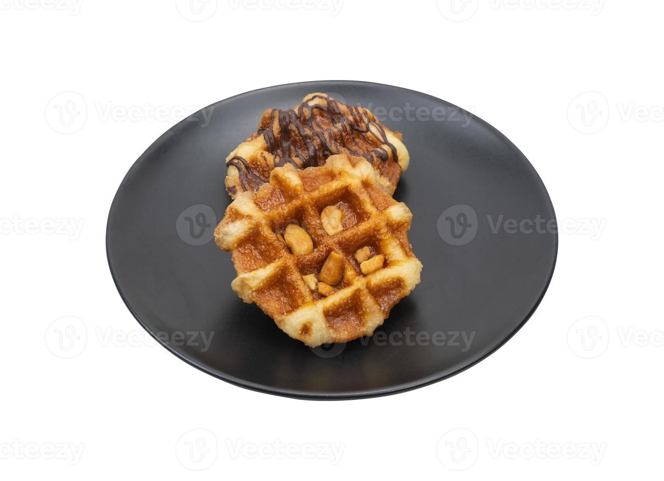Sweet waffles on plate isolated on white clipping path photo