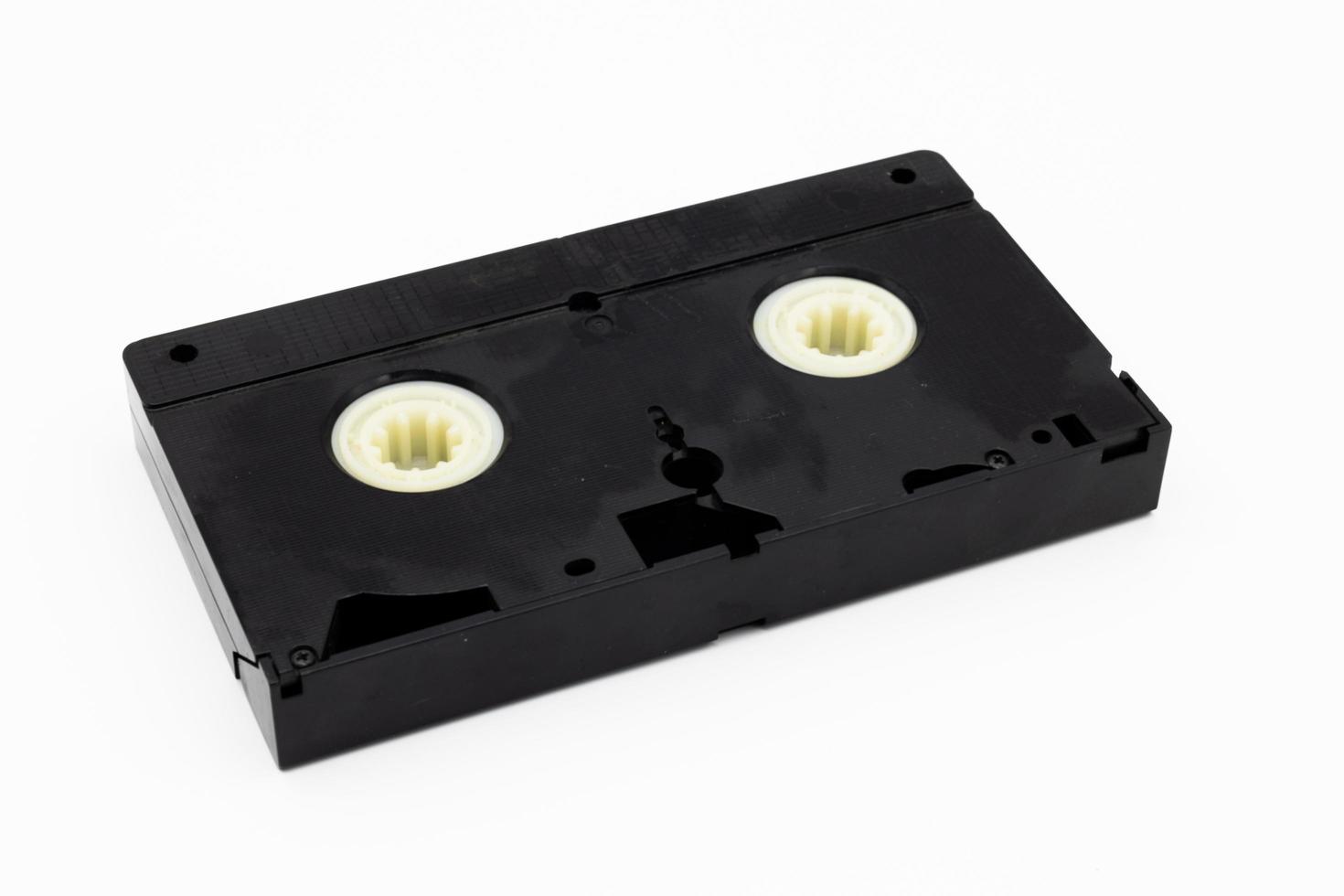 vintage Old analog tape VHS cassette on white backgorund. Retro nostalgia. photo