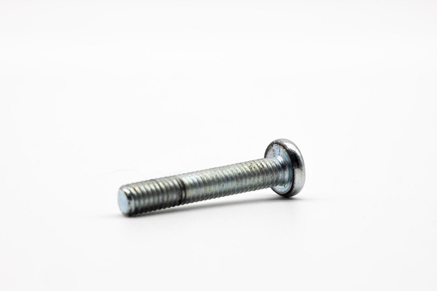 Screw bolt isolated on a white background photo
