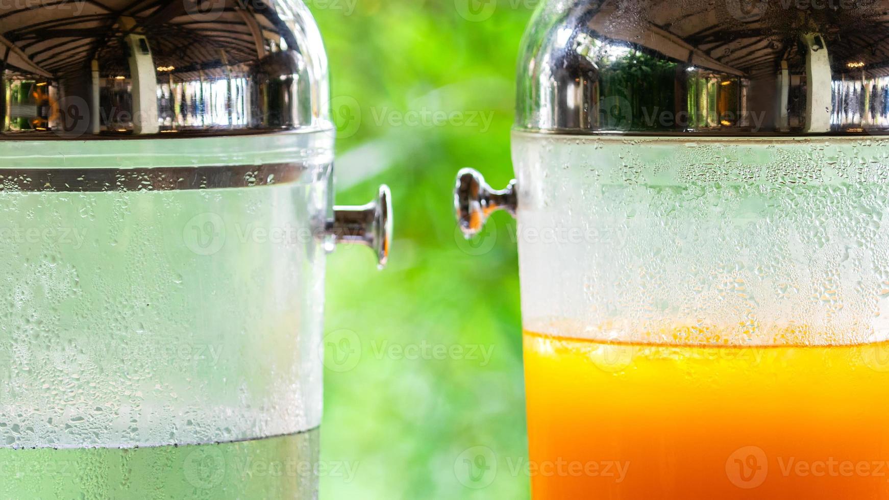 fresh orange juice from fresh orange with high vitamin c from farm in pitcher or jar for freshness in morning with breakfast in restaurang hotel and resort for healthy photo