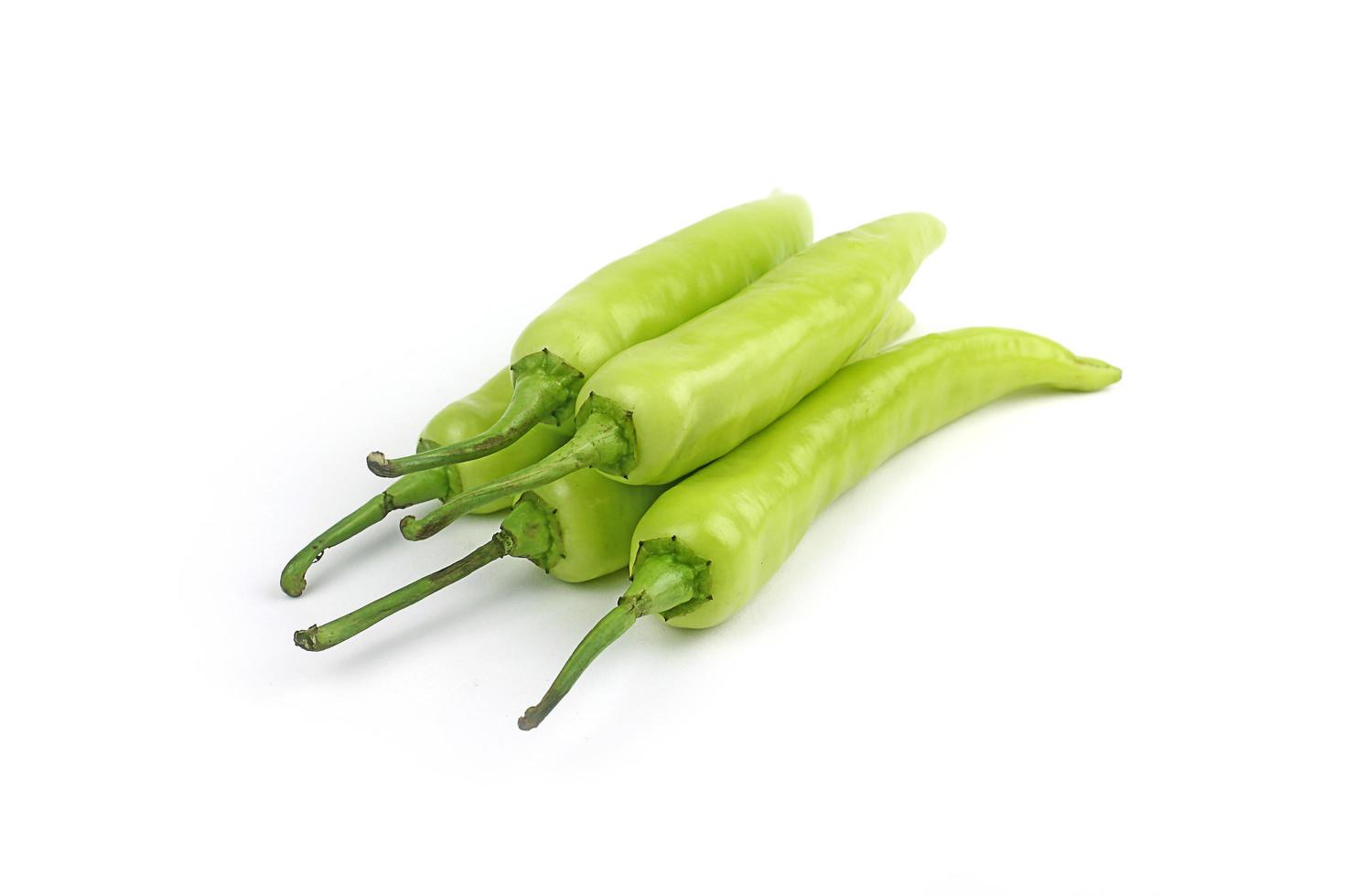 fresh green banana peppers or sweet peppers isolated on a white background photo