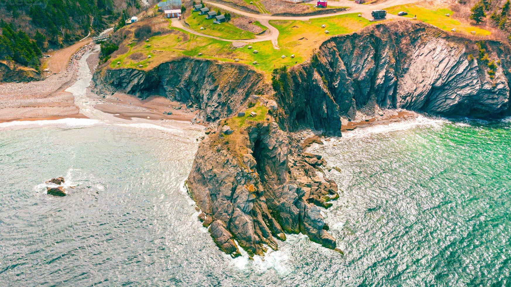 Meat's Cove Aerial View, Cape Breton during a sunny day photo