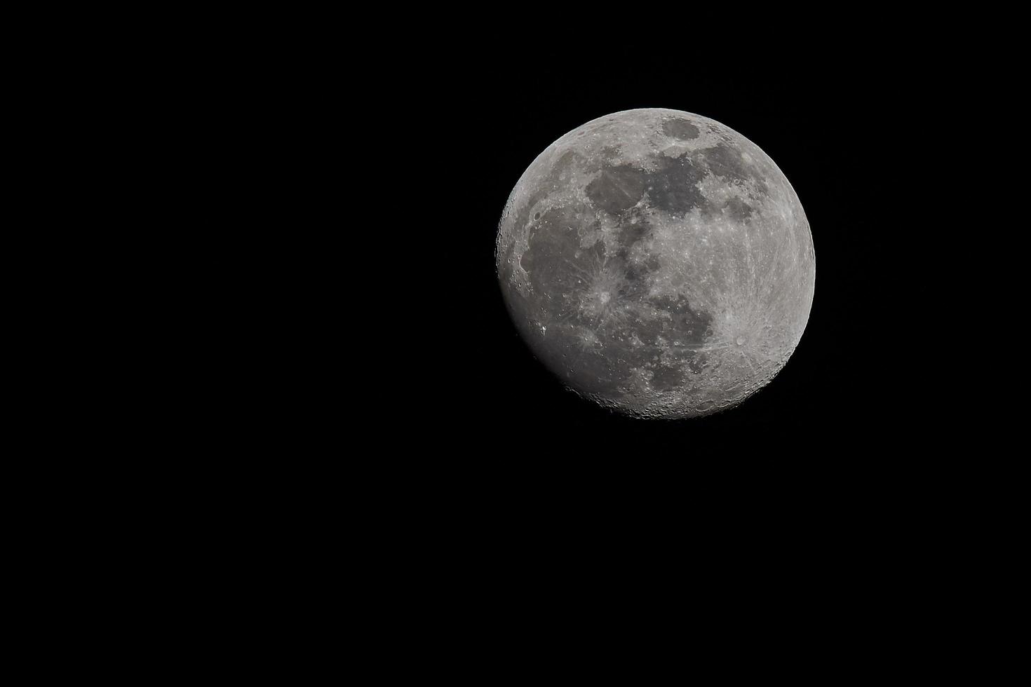 nearly full moon photo