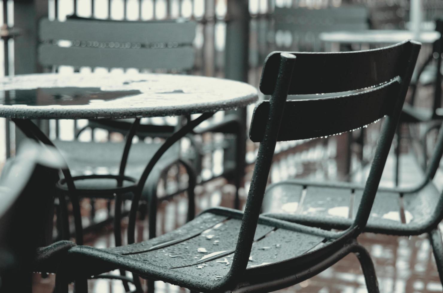 Table and Chairs in Rainny Season. photo