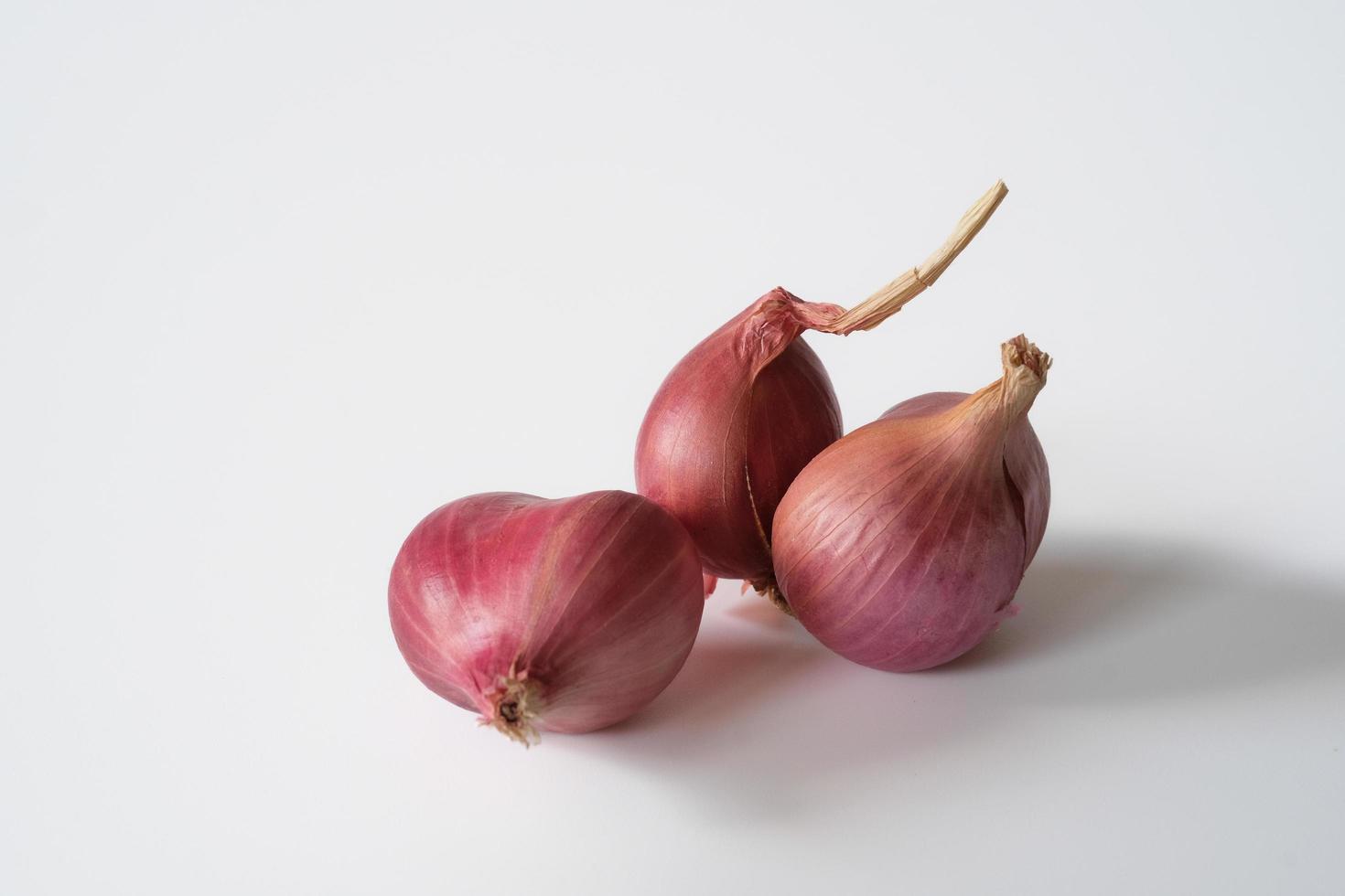 Shallot onions isolated on white background. photo