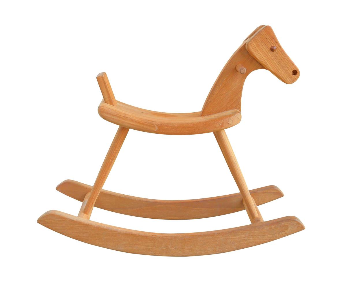 Wooden horse toy for kids to ride isolated on white background with clipping path photo