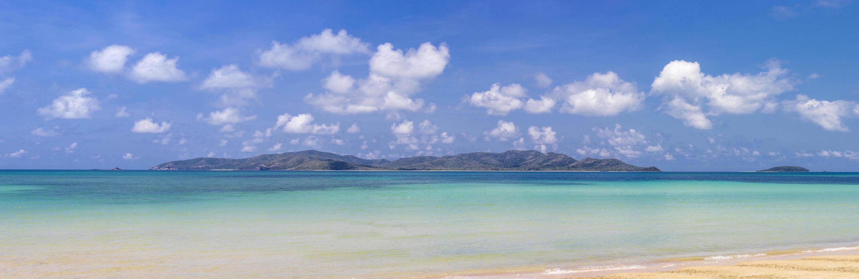 Panorama view of tropical virgin island in clear blue sky summer with turquoise sea water and white sand beach for dream vacation of paradise travel destination and getaway peaceful trip in Thailand photo