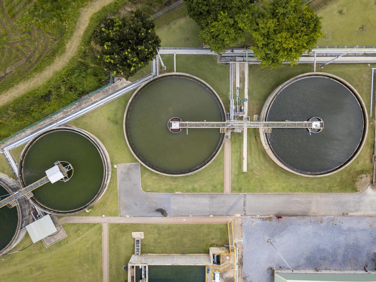 Aerial view of circular water treatment tank for cleaning up and recycling the contaminated wastewater from industrial estate photo