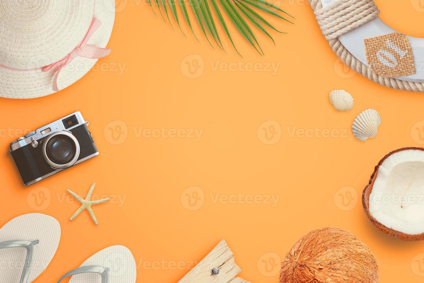 Flat lay traveler accessories on orange background with copy space in the middle. Top view, flat lay travel composition photo