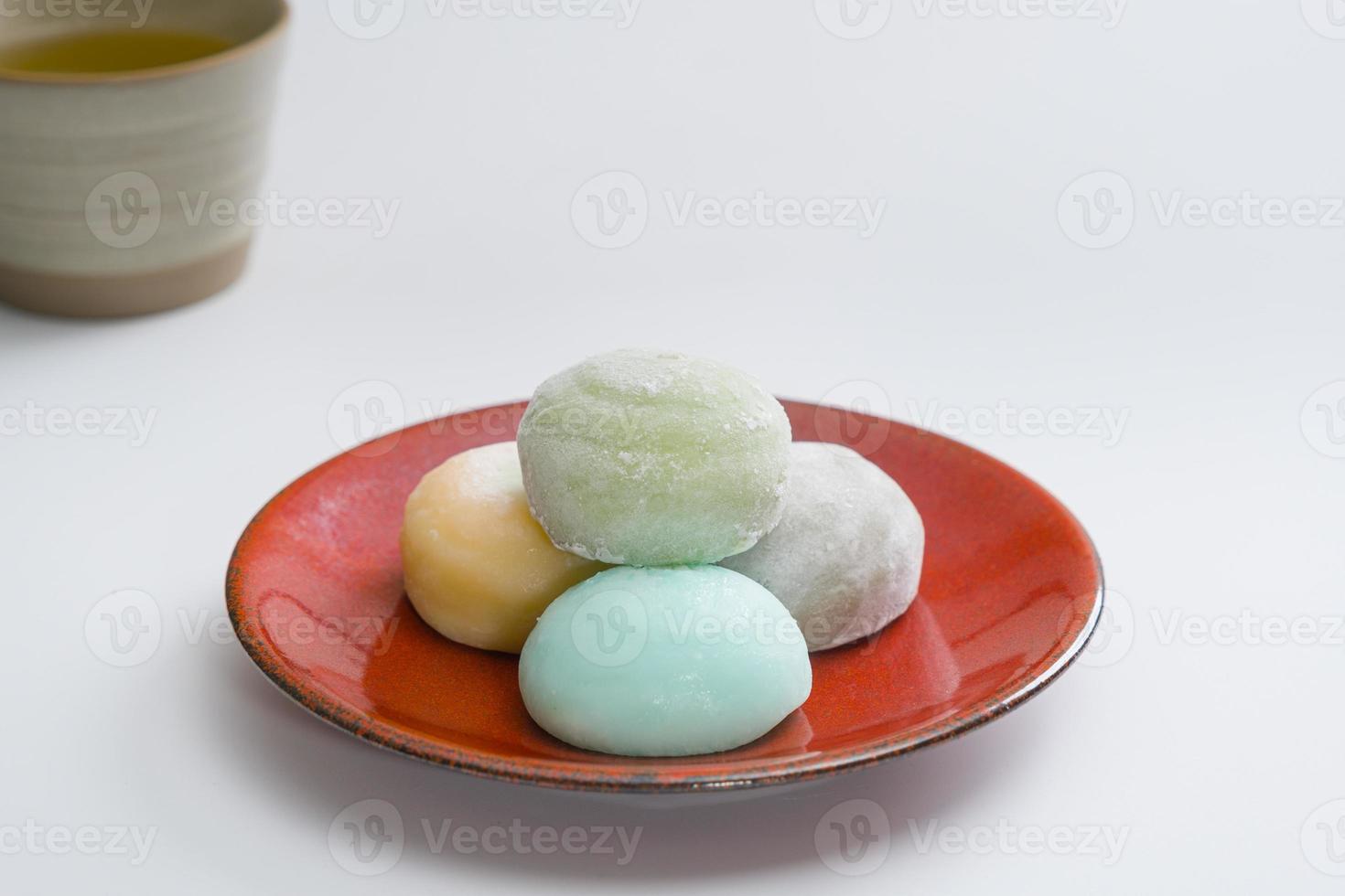 Daifukumochi, or Daifuku, is a Japanese confection consisting of a small round mochi stuffed with sweet filling, Japanese traditional sweets. photo