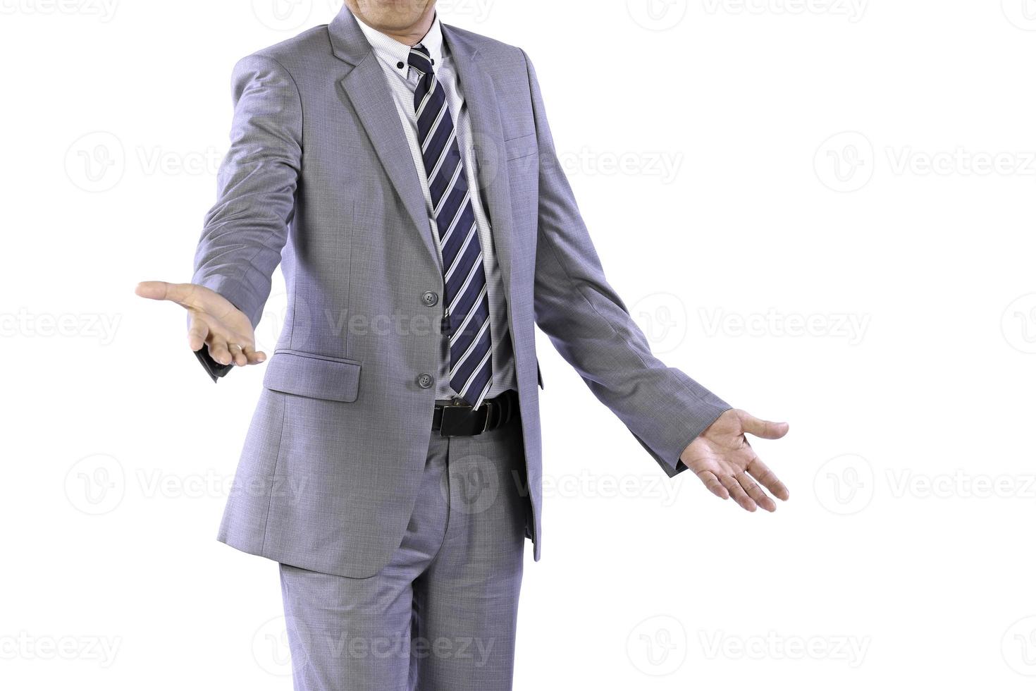 Businessman wearing an elegant suit over white background. Well-dressed senior man in the studio That emphasizes thoughtful thinking, thinking carefully. photo