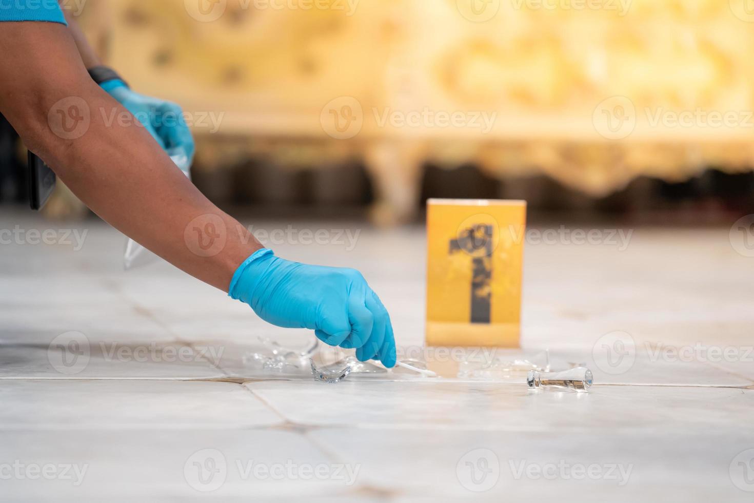 Forensic Scientist's Blue Gloves At the murder scene to collect evidence.soft focus.shallow focus effect. photo