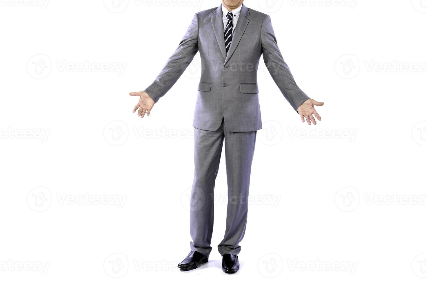 Businessman wearing an elegant suit over white background. Well-dressed senior man in the studio That emphasizes thoughtful thinking, thinking carefully. photo