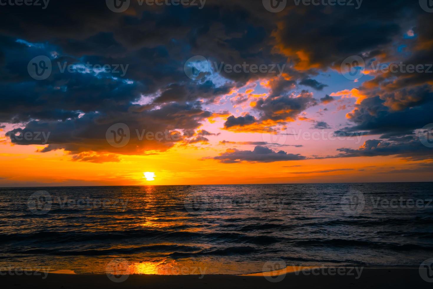 Beautiful sunset over the sea for travel and vacation photo