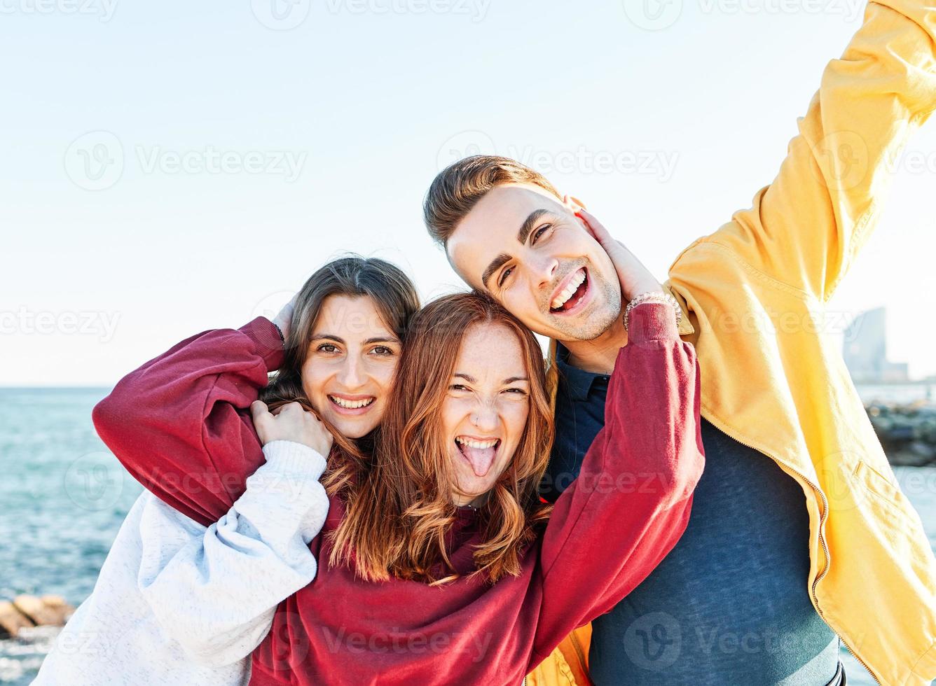 Young friends having fun and laughing photo