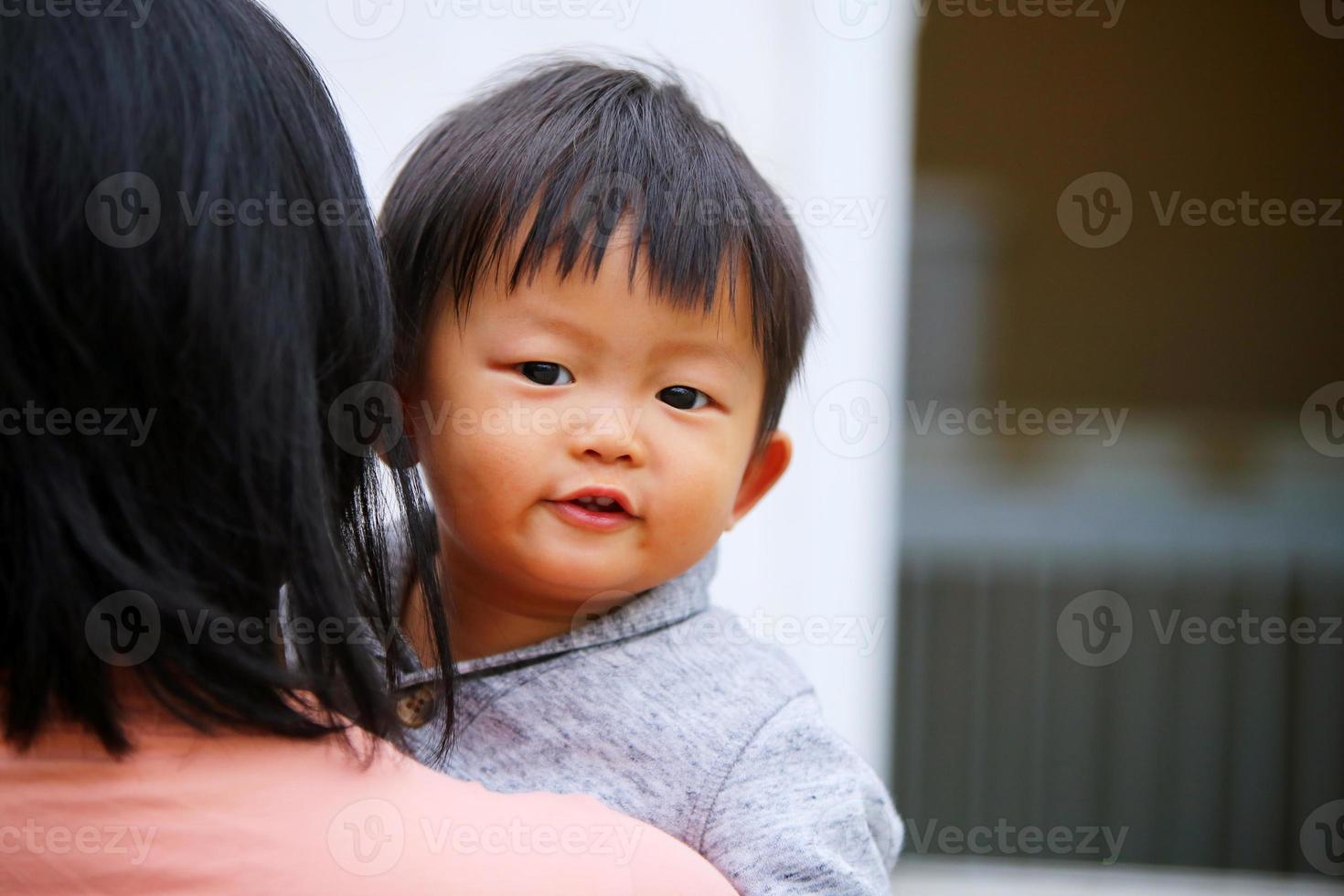 Portrait of asian baby with mother. Woman lifestyle mother's day concept. photo