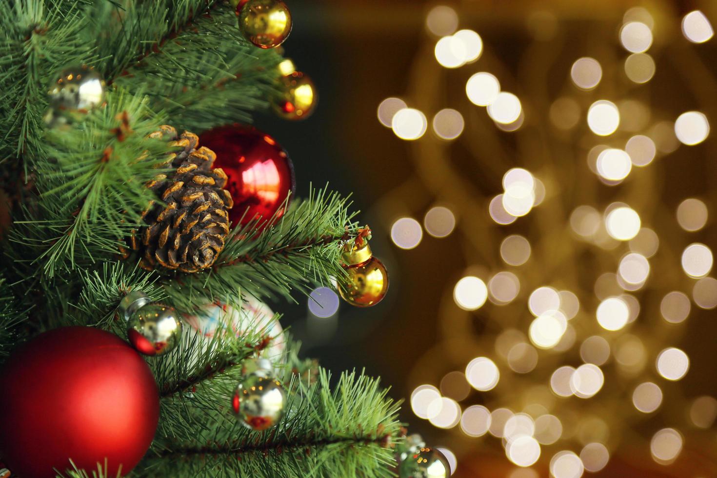 Decorated Christmas tree on blurred background. photo