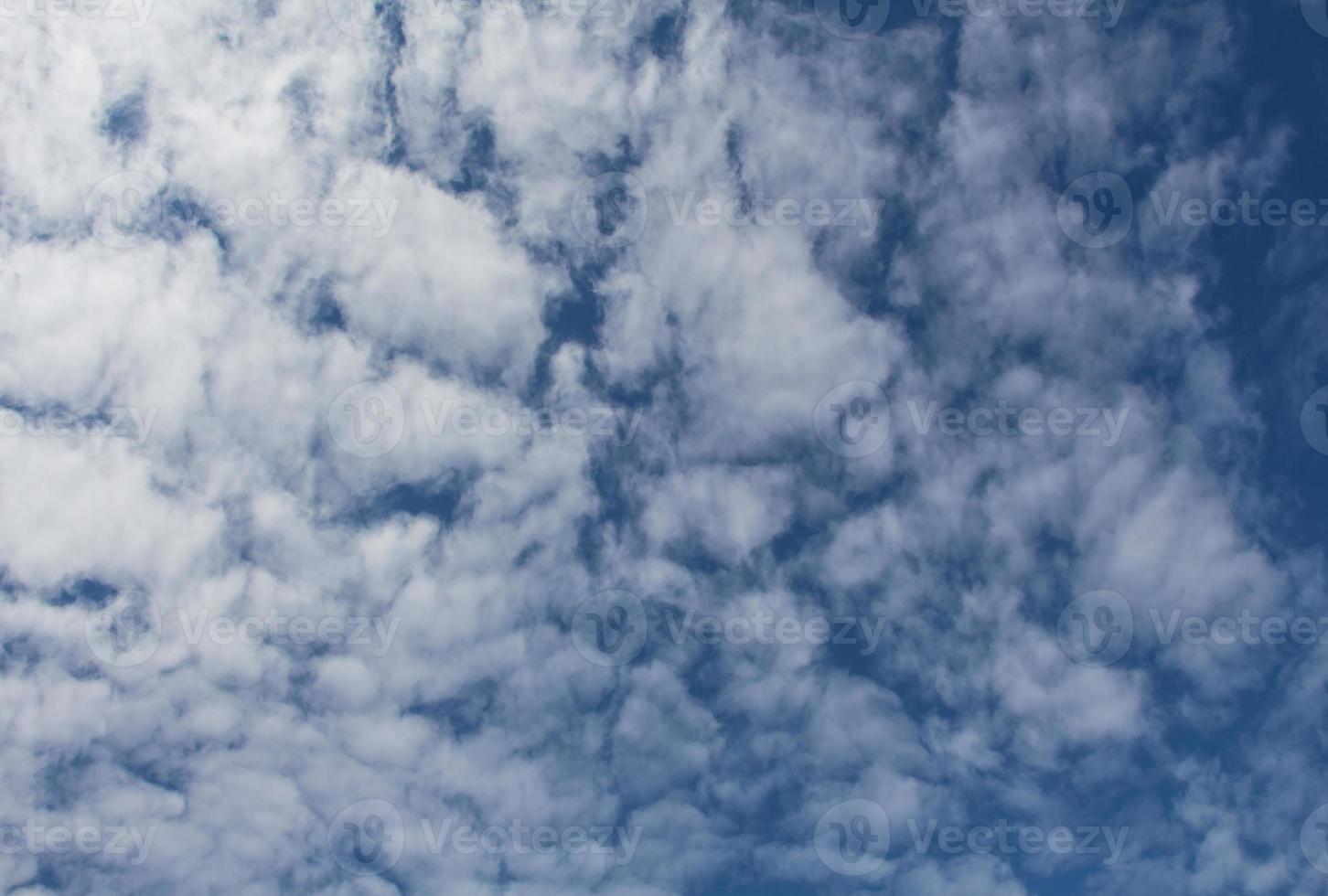 clouds and clear blue sky photo