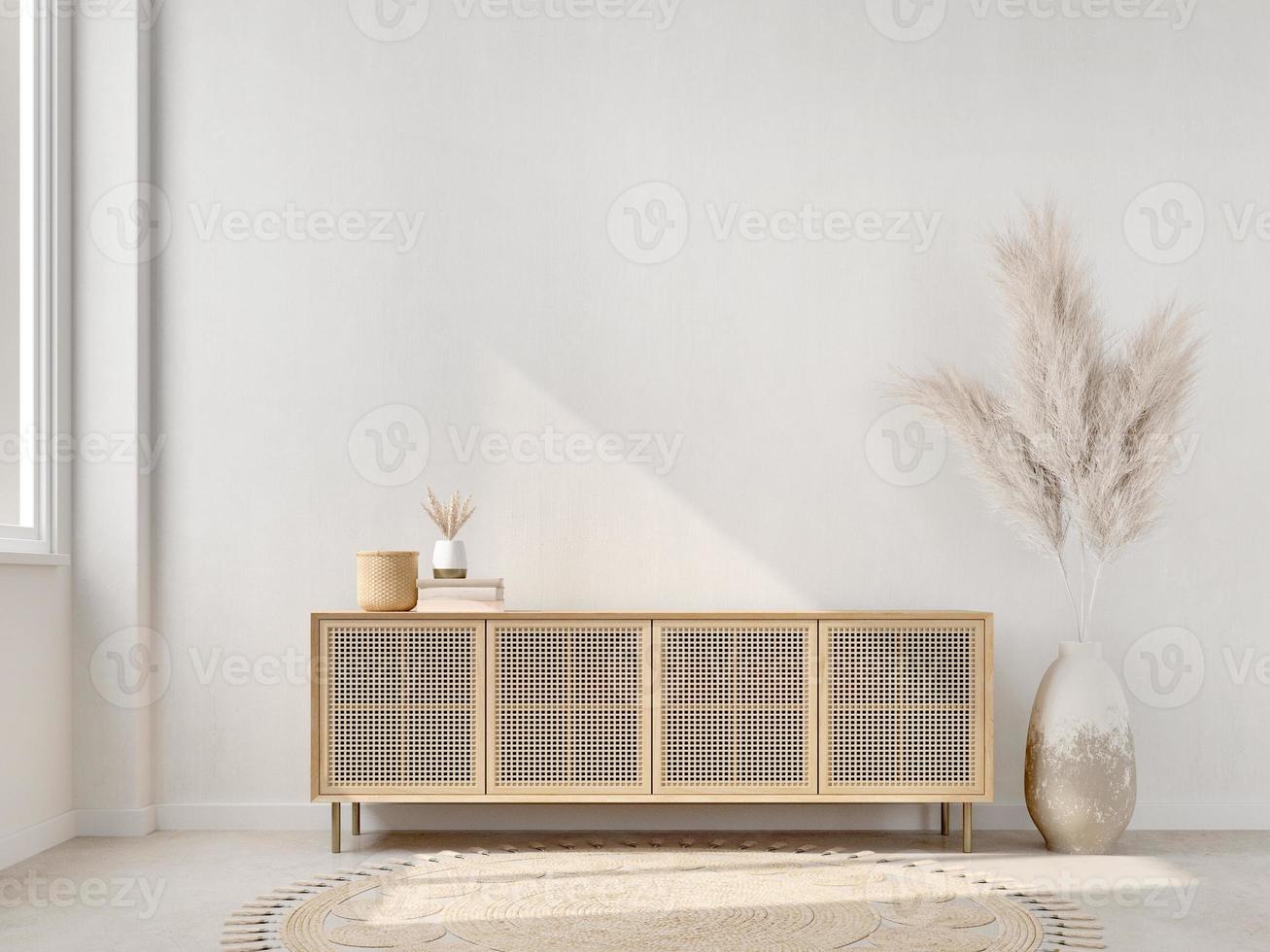 TV cabinet in minimal living room with pampas,pot,rug and sunlight on white concrete wall.3d rendering photo