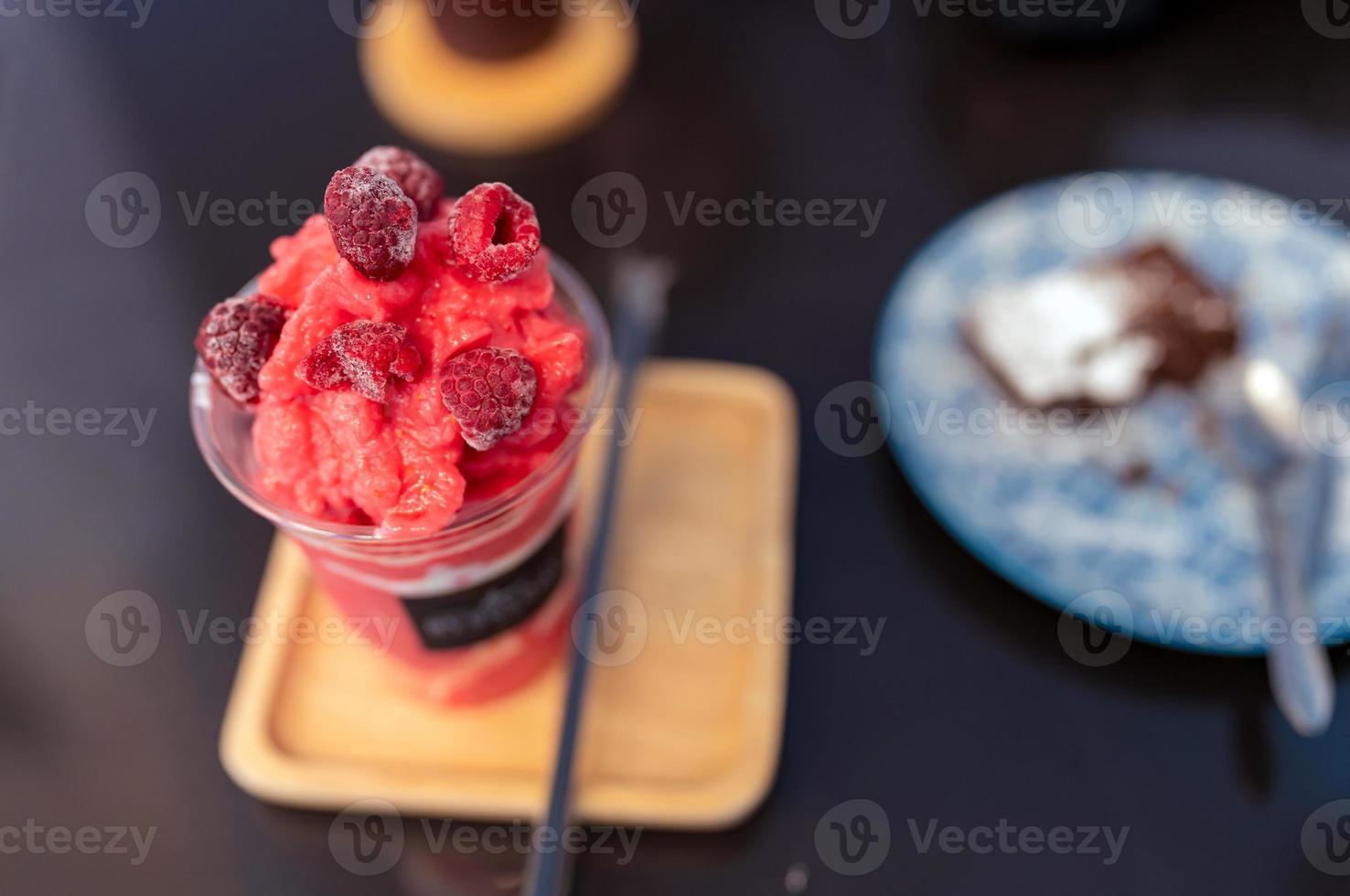 selective focus closeup frozen raspberry frappe on table photo