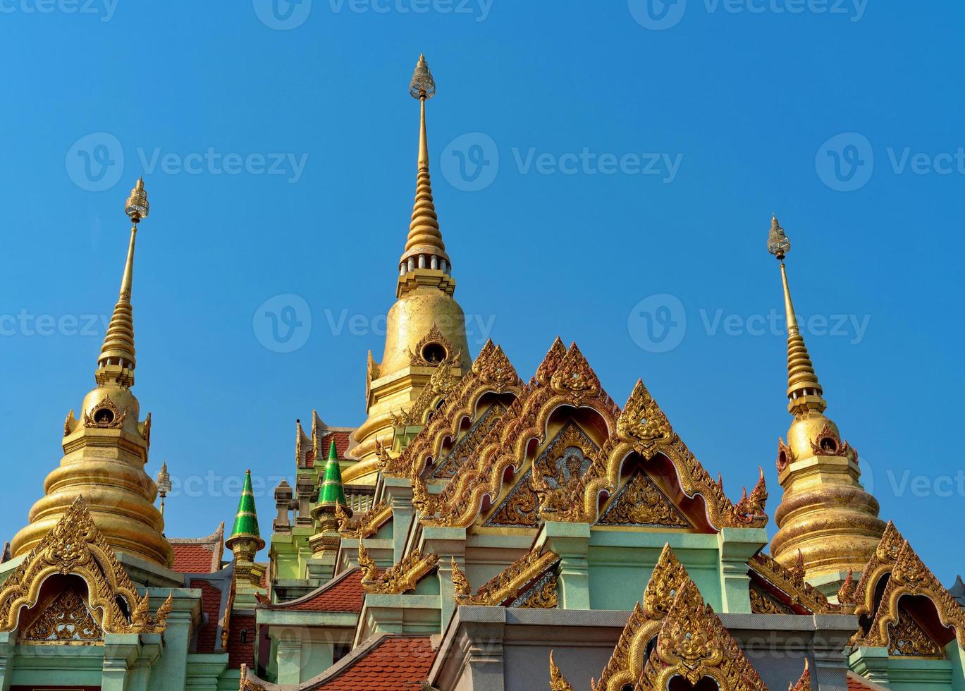 closeup pagodas and roofs of Tang Sai temple photo