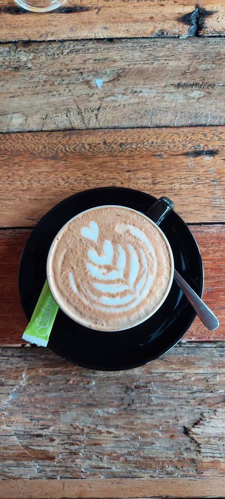 Coffee with love shaped foam photo
