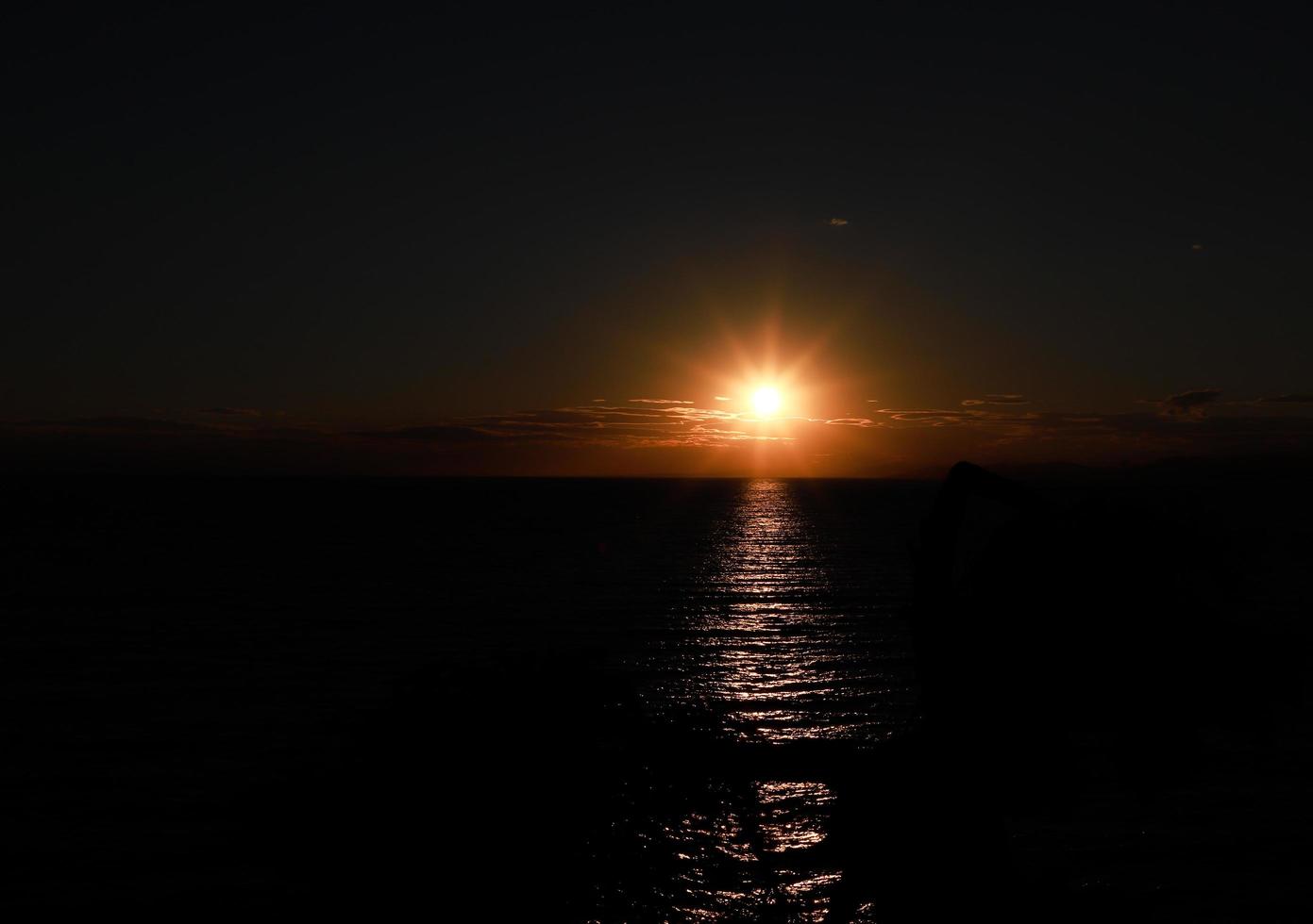 Beautiful sunset over sea in Greece photo