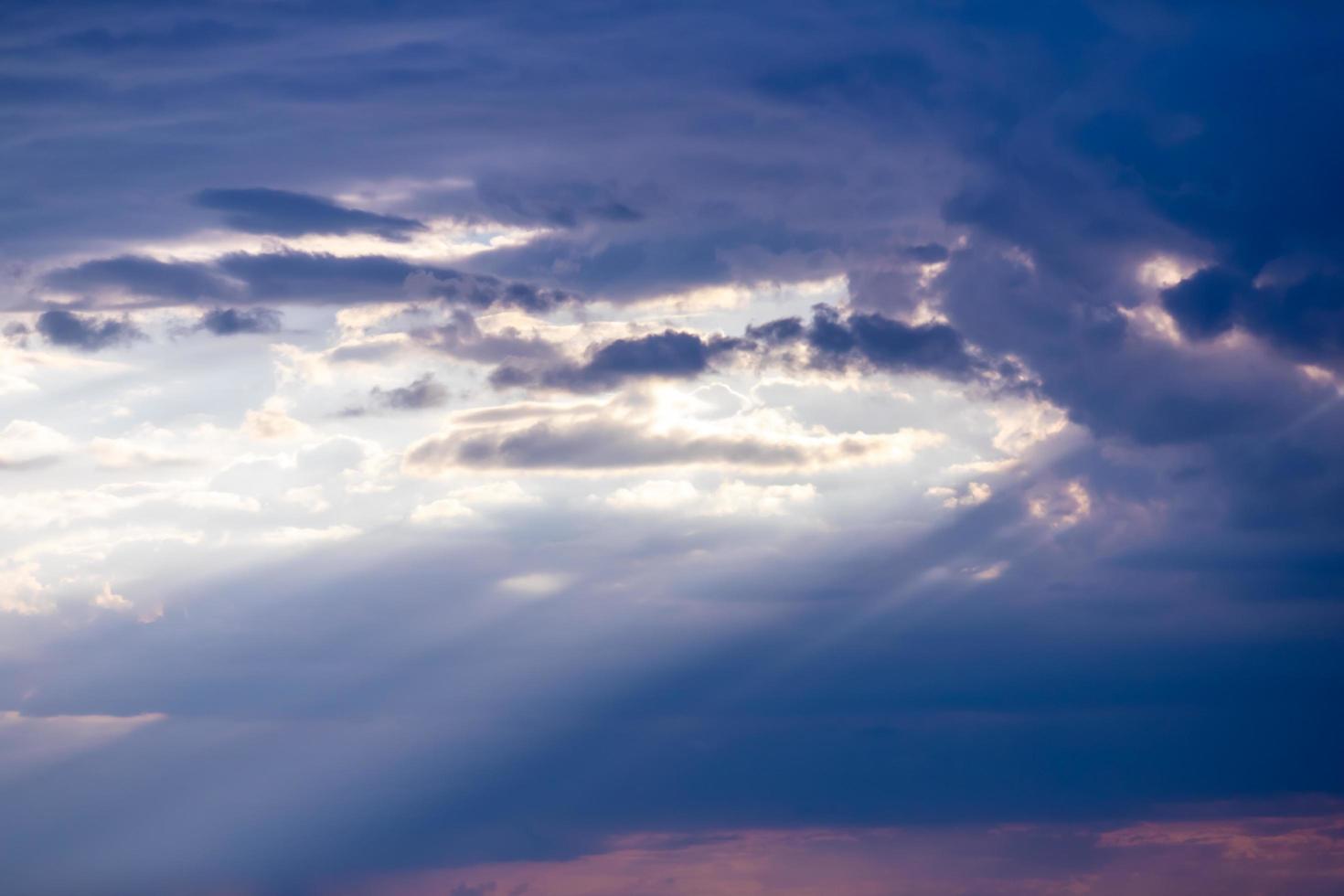 Sunbeams through the clouds photo