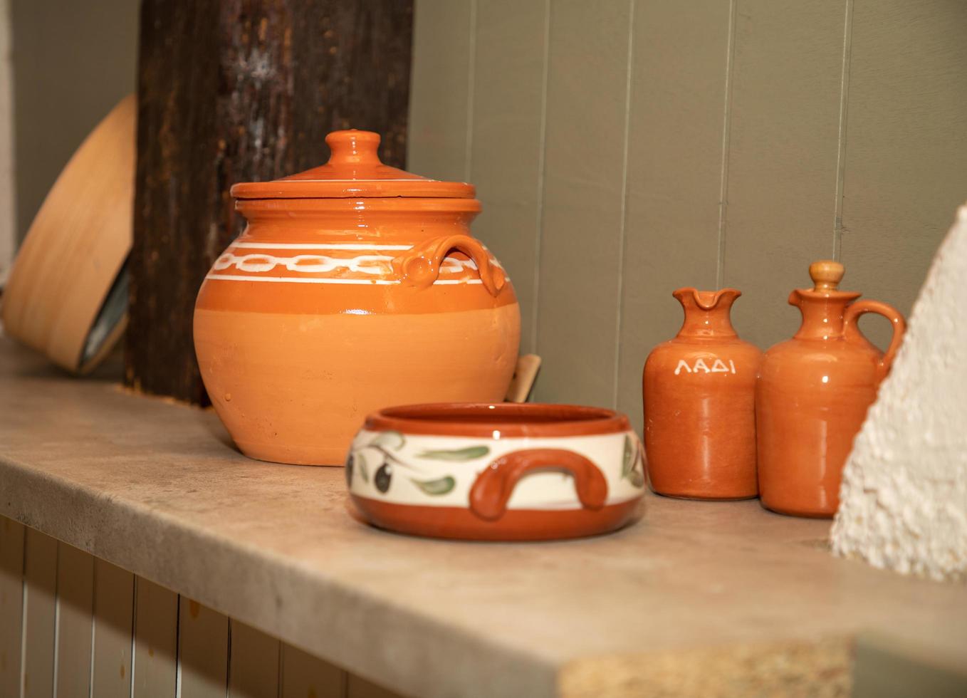 Traditional Greek cuisine and pottery photo