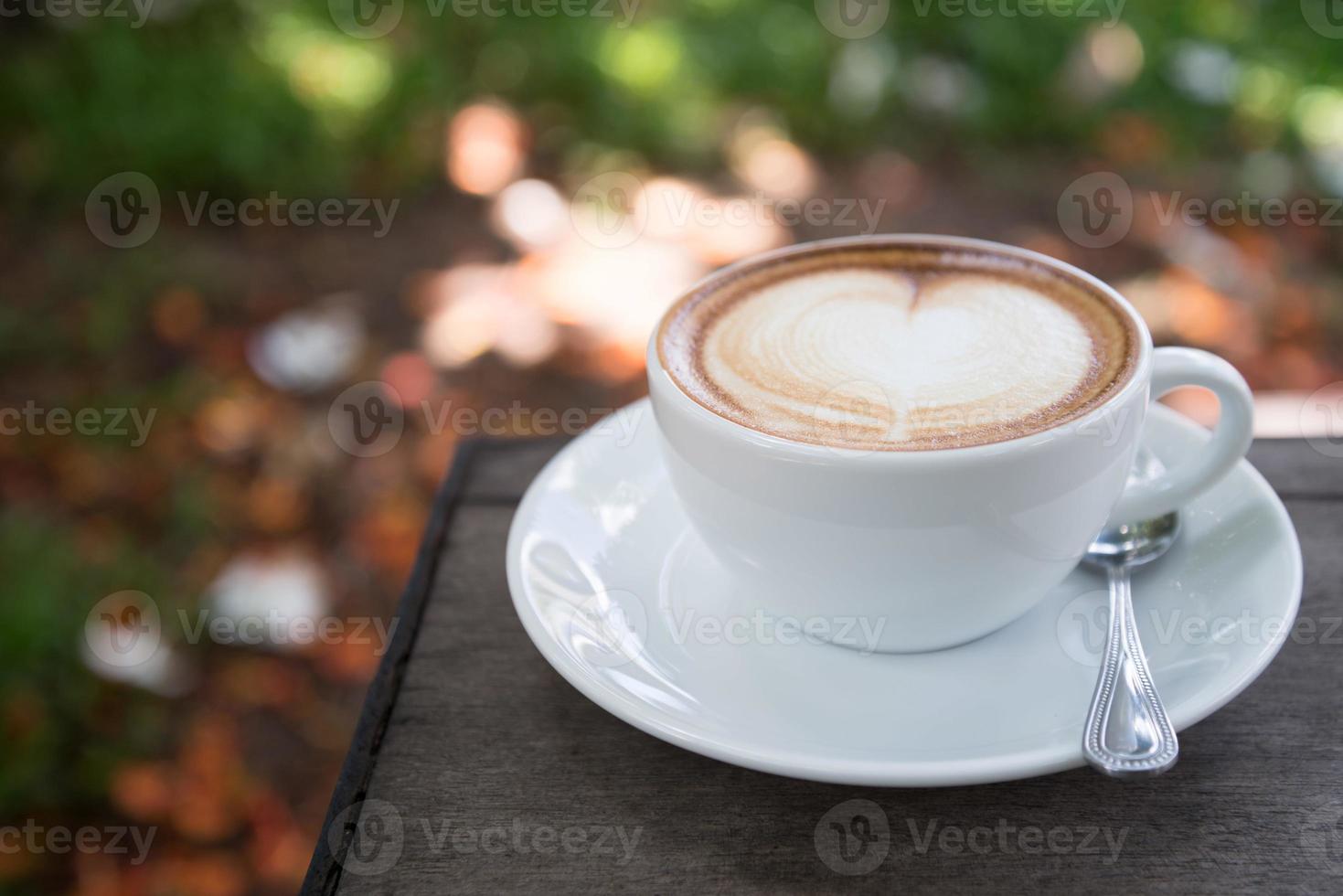 latte art coffee with heart shape photo