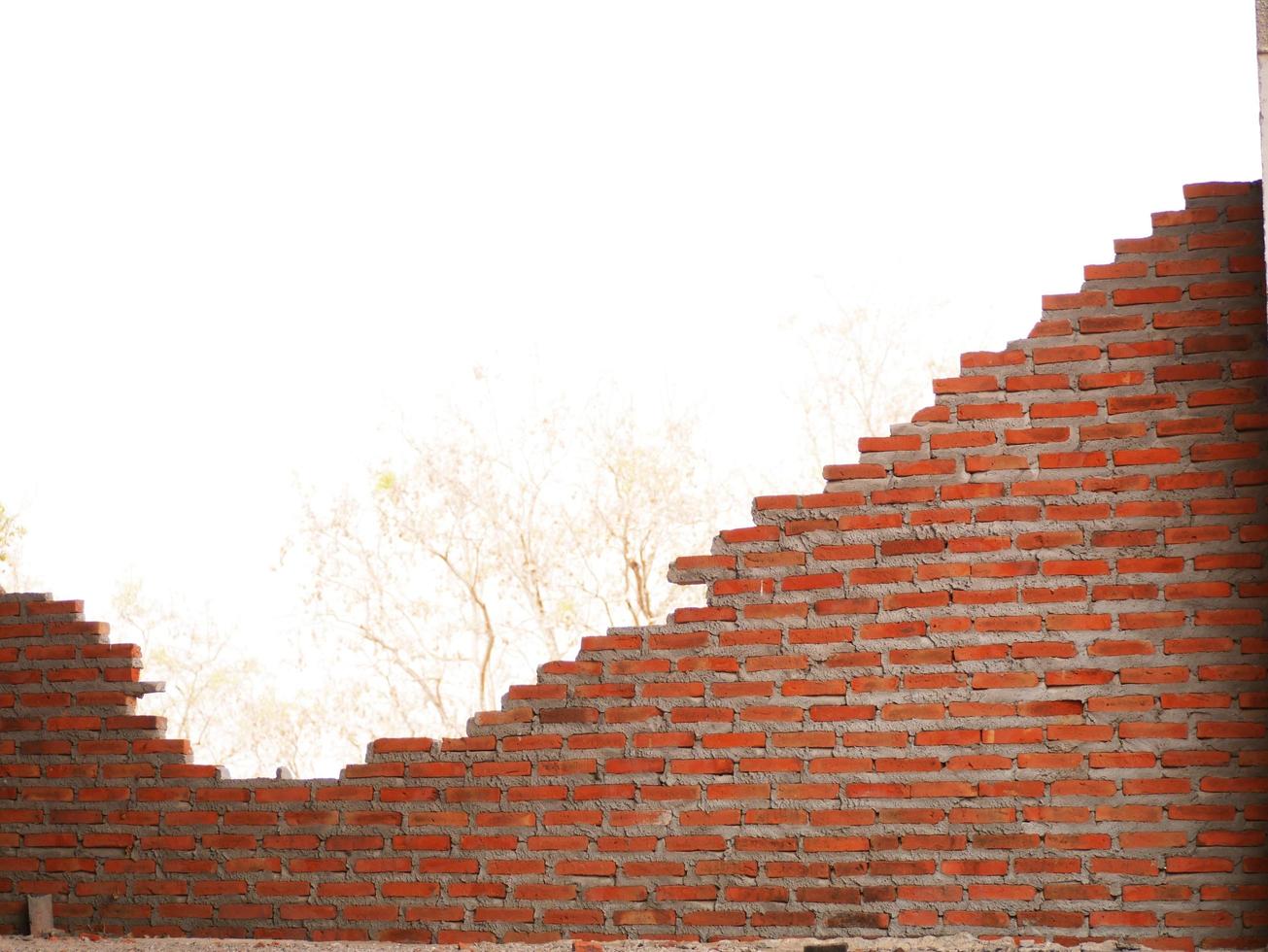 A brick wall being built. photo