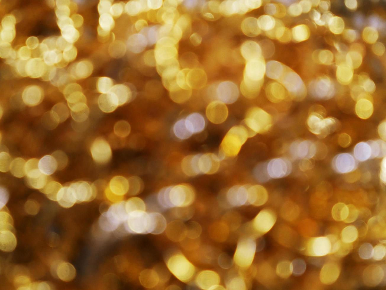 Golden and silver bokeh background image. photo