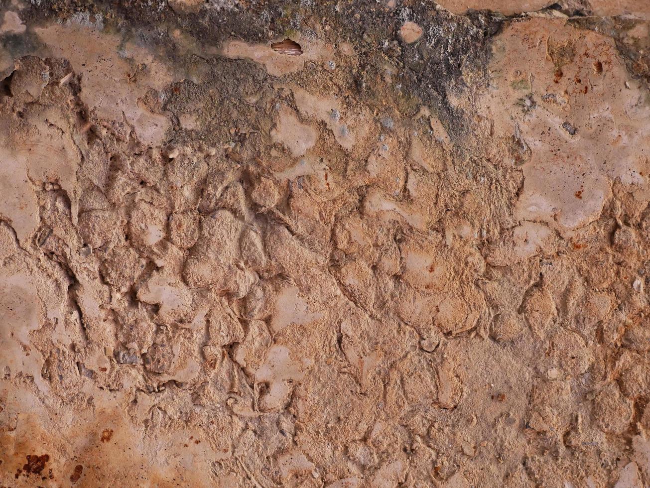 superficie de hormigón agrietado de cemento coloreado, textura de áspera foto