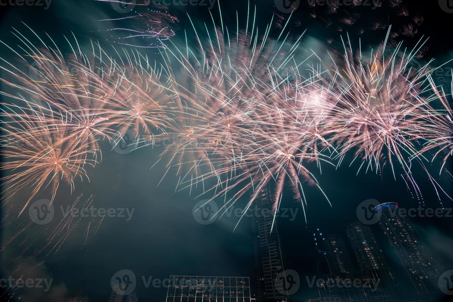 fireworks celebration in the dark sky photo