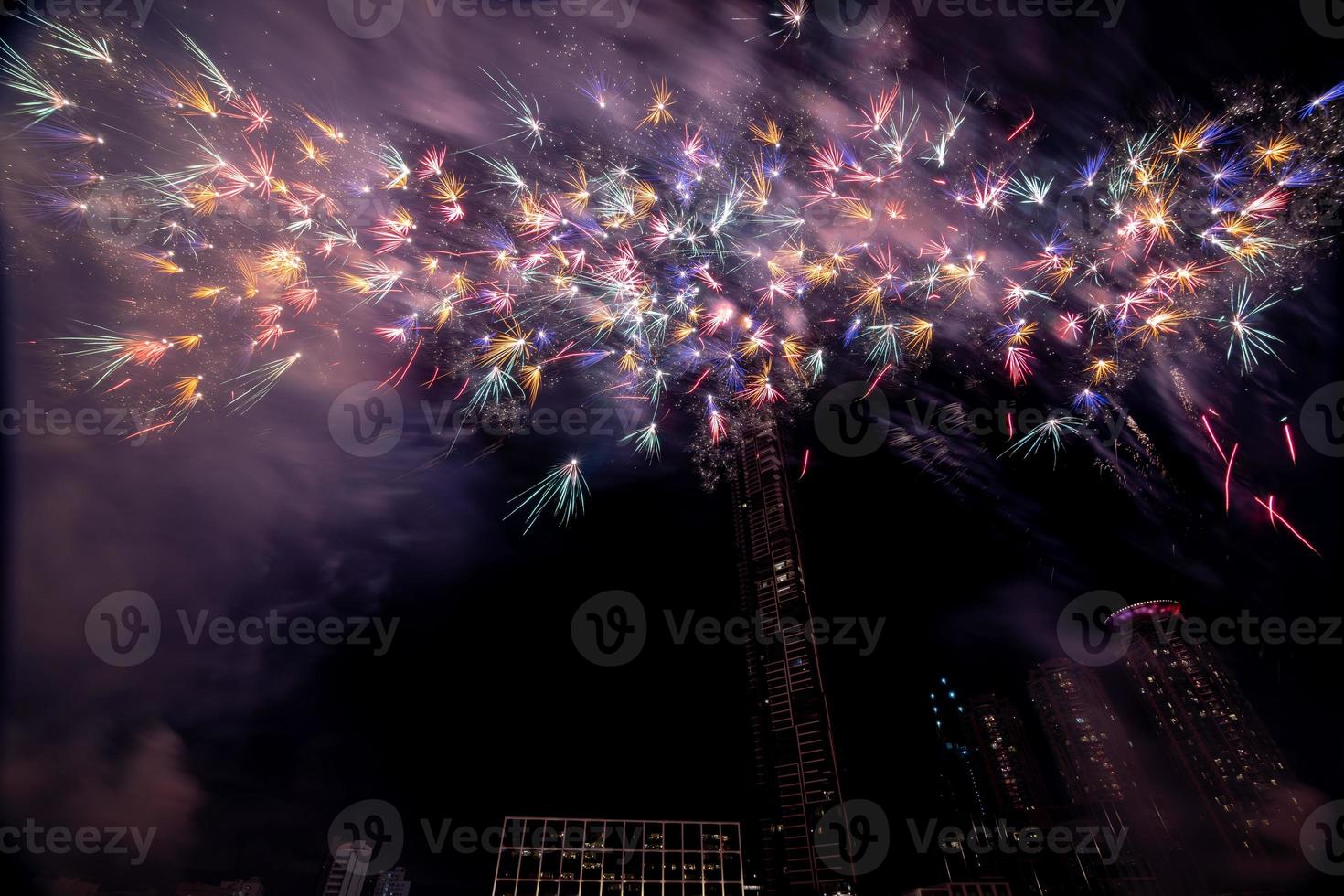 fireworks celebration in the dark sky photo