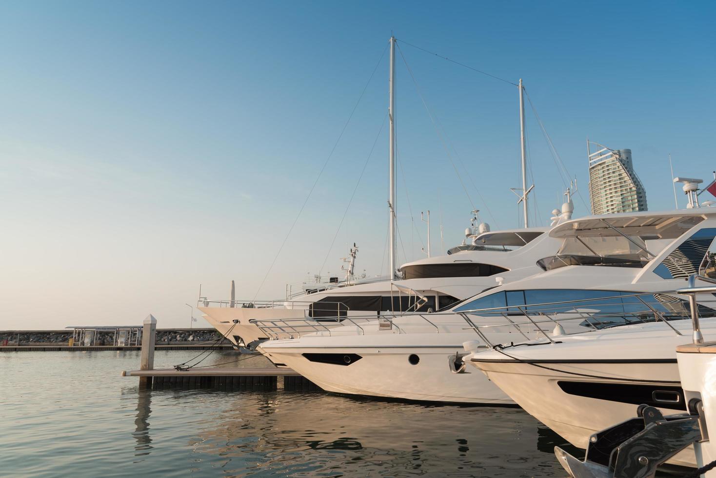 View of Harbor and marina with moored yachts and motorboats in pattaya thailand photo