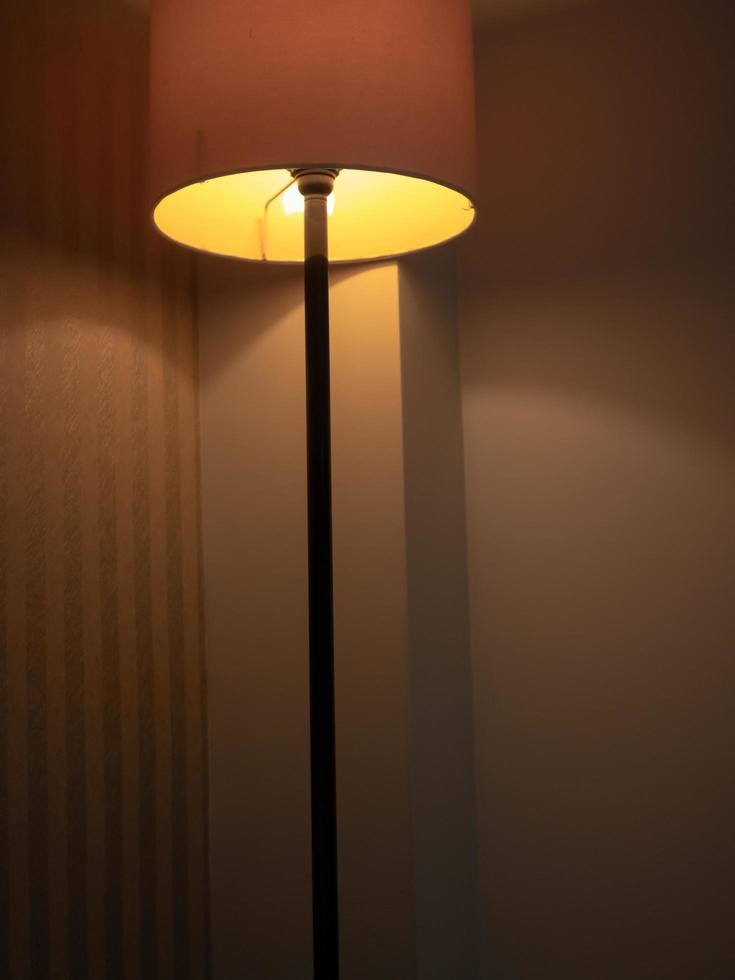 dark blurred background of bedroom lamp photo