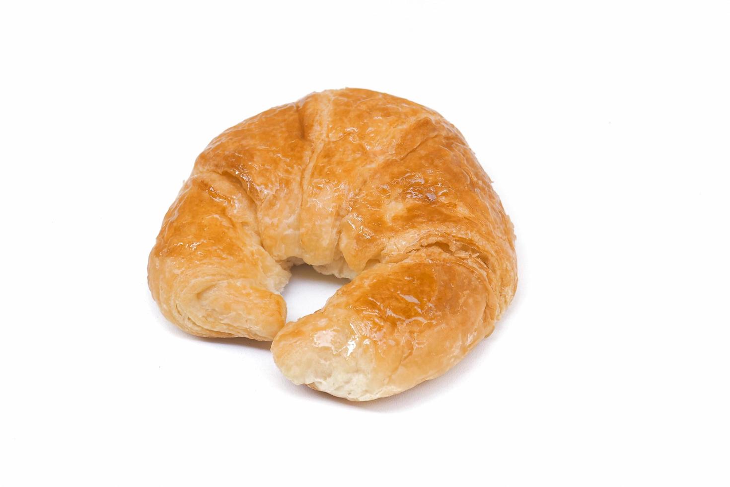 Fresh croissant isolated on white background. photo